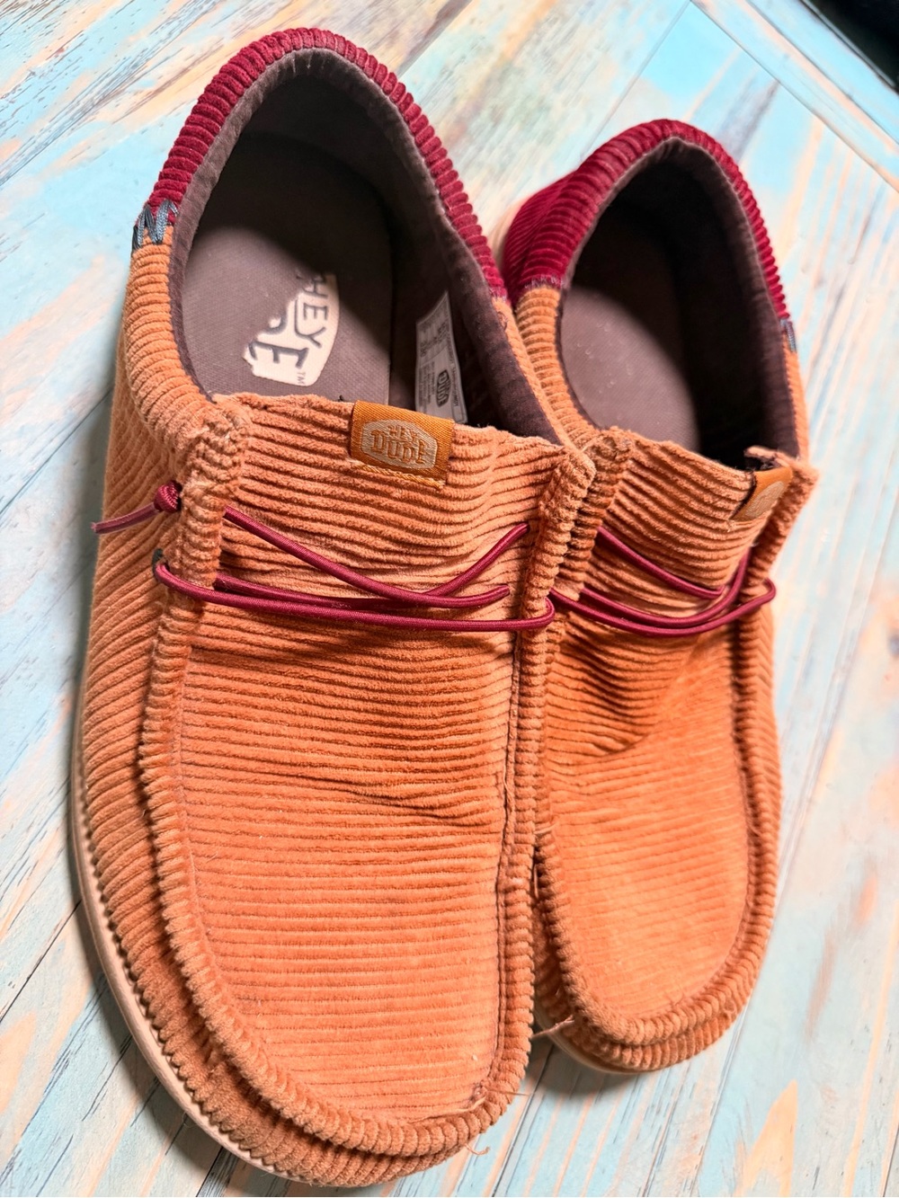 Hey Dude Wally Corduroy Slip-Ons in Rust with Burgundy Accent